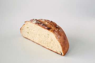 Half of a homemade loaf of white bread