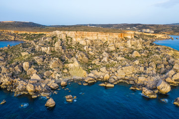 Aerial view of nature cliffs. Mediterranean sea, evening, sunset. Malta, winter
