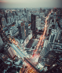 Fototapeta premium Aerial view of Asoke intersection and sky train station in Bangkok Thailand