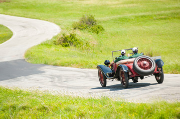 Vintage car at Mille Miglia italian race - 345102202