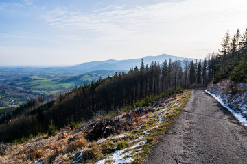 view of the valley and Lysá hora and the field in spring, czech beskydy Celadna