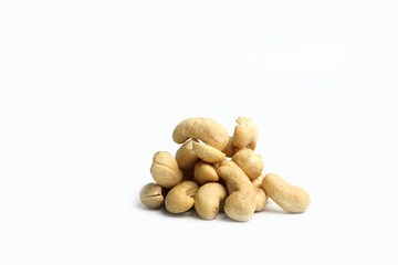 Fototapeta na wymiar A pile of cashew isolated on white background. Image contains copy space