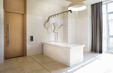 Table for water massage in a beauty salon