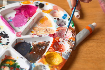 painting material on wooden background