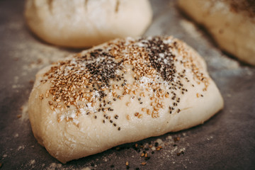 Uncooked bread with sesame and chia seeds