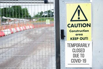 Closed construction site sign due to Coronavirus Covid-19