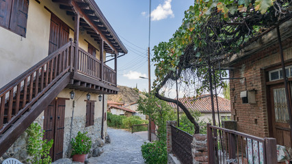 Fototapeta na wymiar Old hauses and narrow streets of Kakopetria village in Cyprus.
