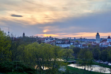 Fototapeta premium Panorama of Vilnius city during the sunset on a cloudy day