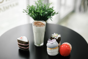 banana milkshake with chocolate chips and plush cakes