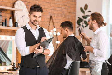 Professional hairdresser during courses in salon