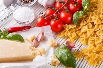 concept of traditional italian pasta with tomatoes and basil