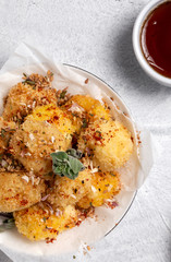 Fried small cheese mozzarella balls breaded in panko