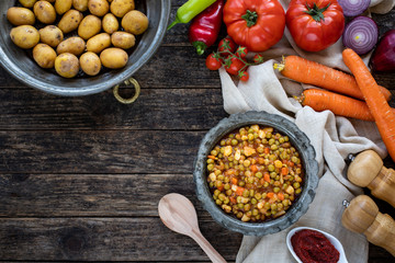 Vegan foods with top view like green peas, carrot, potatoes and onion