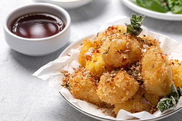 Fried small cheese mozzarella balls breaded in panko