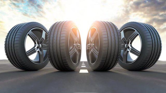 Four car wheels on the road.  Auto service, workshop or changing car tyres concept. 3d animation