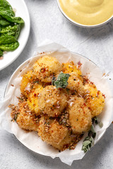 Fried small cheese mozzarella balls breaded in panko