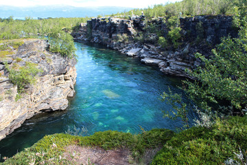 Kungsleden river in the arctic tundra. Abisko national park, Nothern Sweden
