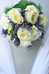 Bridal bouquet from white and purple flowers. Close up of wedding bouquet.
