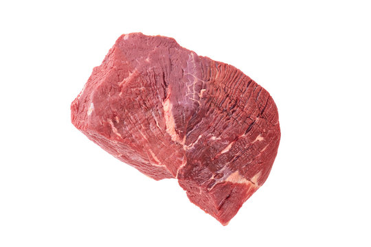 A large piece of peeled side of veal meat on a white background. A fresh piece of knuckle. The view from the top.