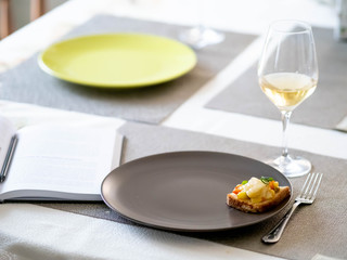 remote work from home. home office. sandwich on a plate. glass of wine