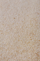 natural organic semolina on white acrylic background