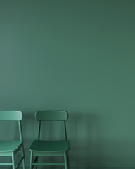 Monochrome green interior with two chairs