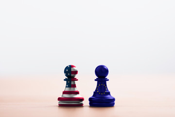 USA flag and EU flag print screen on pawn chess for battle.It is symbol of United States of America...