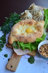 Georgian cheese-pie (khachapuri) and Georgian Dumpling (khinkali)
