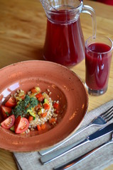 Spelt with vegetables and juice