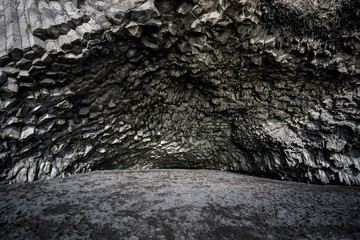 Reynisfjara Beach, Iceland - small cave with stone formations