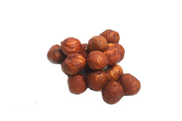 A pile of hazelnut isolated on white background. Image contains copy space. Flat lay