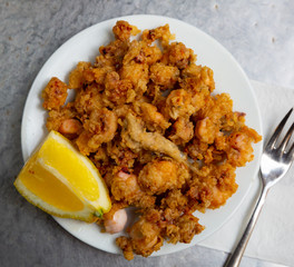 Fried Andalusian baby squid in a batter of tempera flour