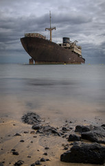 rusting sunken stranded ghost ship near the harbour of Arrecife on Lanzarote one of the Canarie...