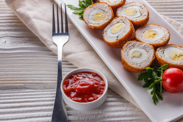 Scotch egg meat balls on rustic wooden background
