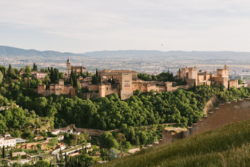 Fototapeta na wymiar View from above of the Alhambra fortification with the city of Granada in the background.