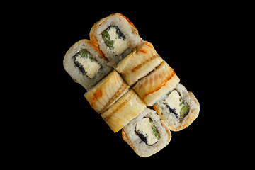 Japanese food: Set of salmon sushi and rolls with salmon and eel