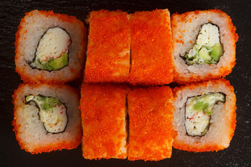 Japanese food: Set of salmon sushi and rolls with salmon and eel