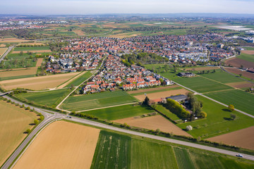 Fototapeta na wymiar Aerial view of the village Münchingen in Germany on a sunny morning in early spring 