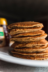 Homemade pancake cake with butter and honey for breakfast