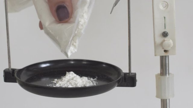 weighing Cocaine Drug powder, close-up