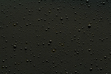 Water droplets on black background