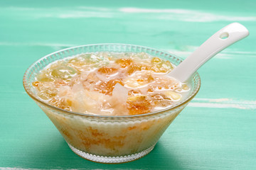 bowl of healthy syrup of peach gum and white fungus and lotus seeds