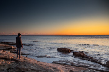 silhouette of a man on the beach