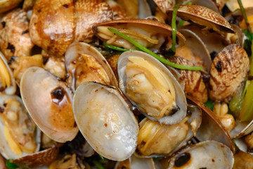 fresh fried clams  in a dish
