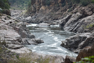 Wild river flowing between Rocks