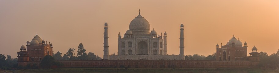 Fototapeta na wymiar Panoramic beautiful Taj Mahal at sunset in the Indian city of Agra, Uttar Pradesh, India.