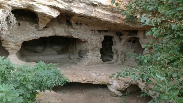 Samandag, Hatay / Turkey : October 30 / 2019 : Besikli magara (meaning cave with cradles) which is tombs of the kings near to titus vespasianus tunnel at samandag, hatay