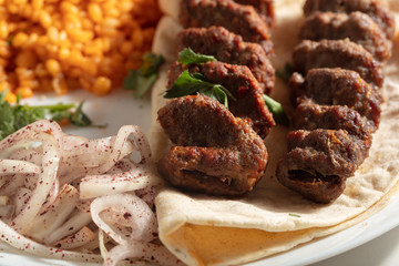 Traditional Adana Kebap with salad