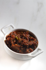 Traditional Turkish appetizer meze - Acili ezme, Chili hot peppers
