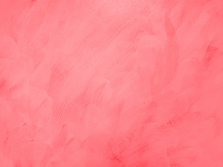 Coral color on spreaded cement textured background